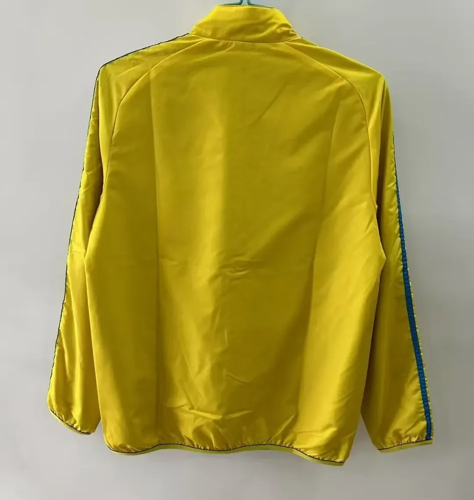 2025/2026 Barcelona Chaqueta Cortavientos Reversible amarilla y azul Camiseta de Fútbol Calidad Tailandesa