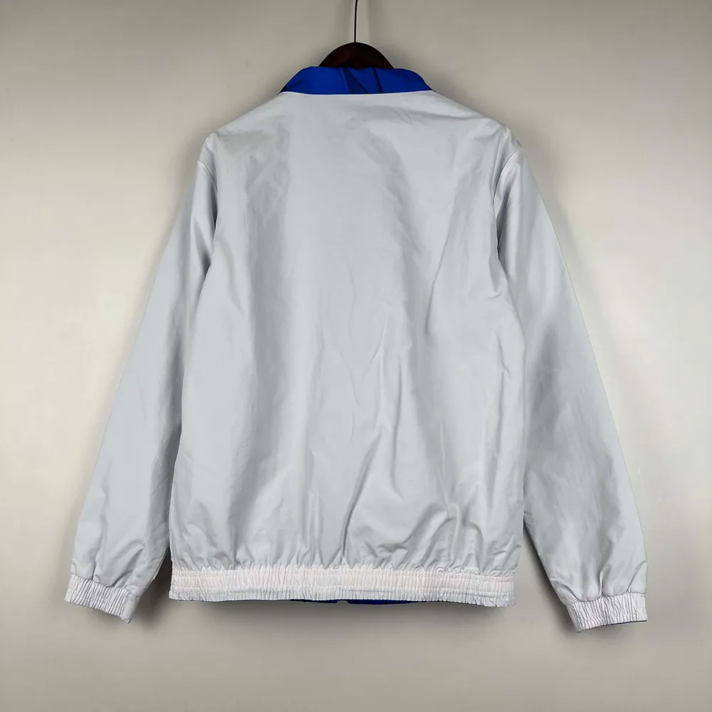 Chaqueta cortavientos reversible del Al-Nassr 2023/2024 (blanca-azul) Camiseta de fútbol Calidad Tailandesa